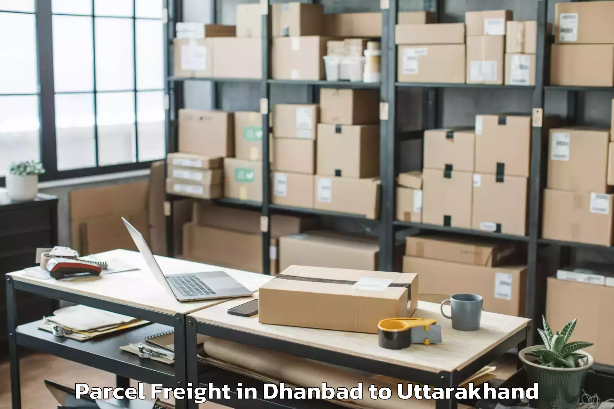 Easy Dhanbad to Harbatpur Parcel Freight Booking